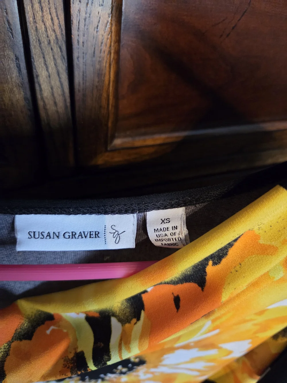 Susan Graver Black Liquid Knit Top with Orange and Yellow Floral Accent - Picture 3 of 3